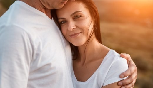Happy adult couple in countryside Happy adult couple in countryside