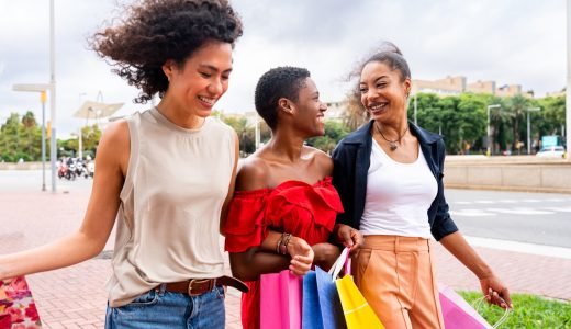 Three mixed race hispanic and black women bonding outdoors Three mixed race hispanic and black women bonding outdoors